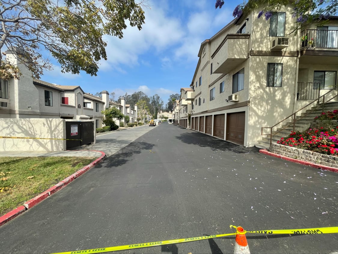 Private street through an apartment community after grinding and resurfacing